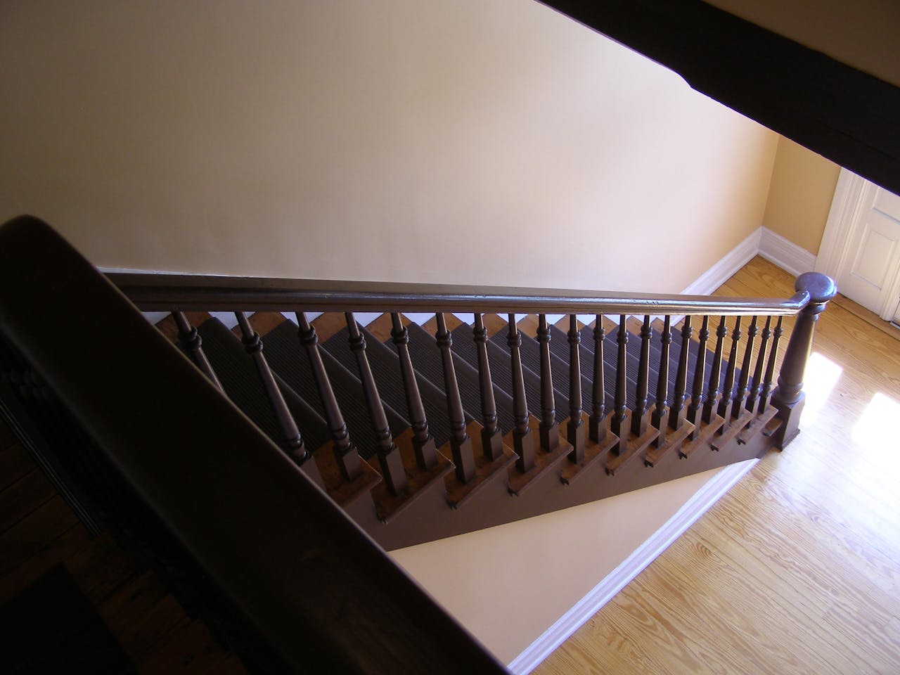 Why do some stairs have angled risers?